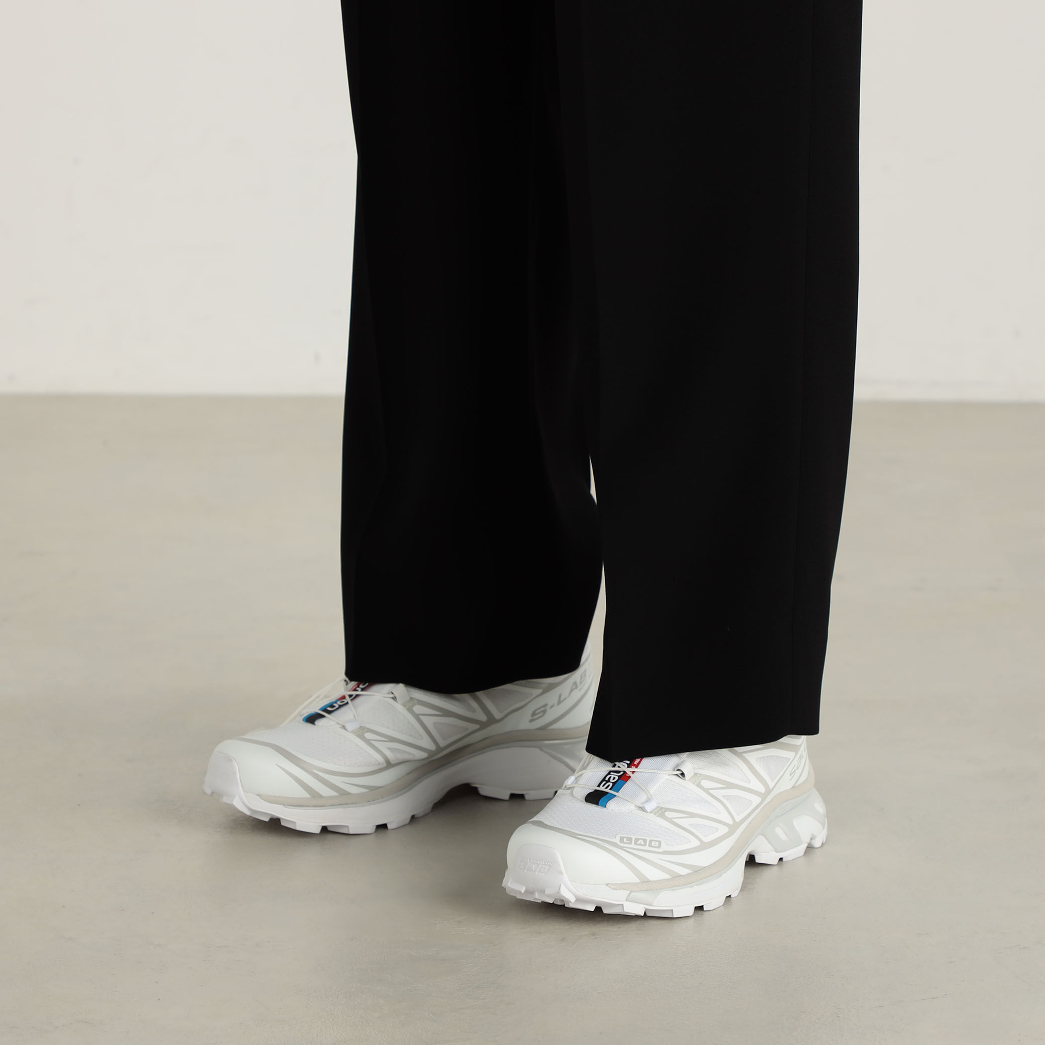 バックサテンジョーゼット スラックス｜トゥモローランド 公式通販