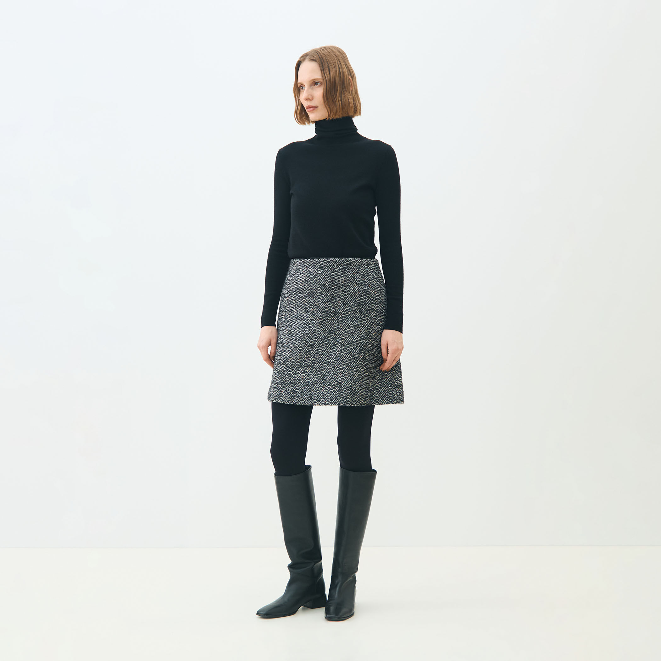 カラーネップホームスパン トラペーズミニスカート｜トゥモローランド