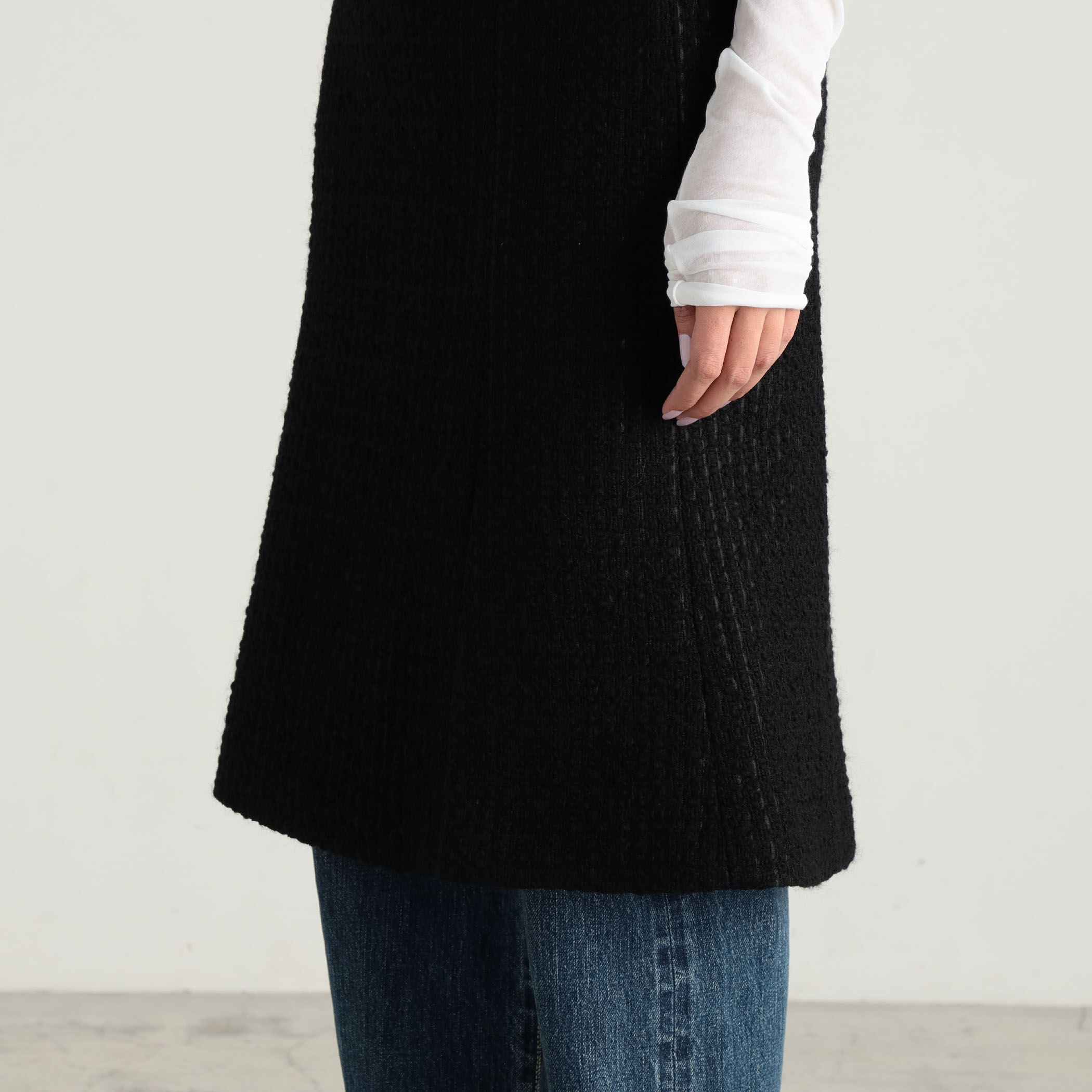 ○ブラックツイードヘムフレアスカート｜トゥモローランド 公式通販