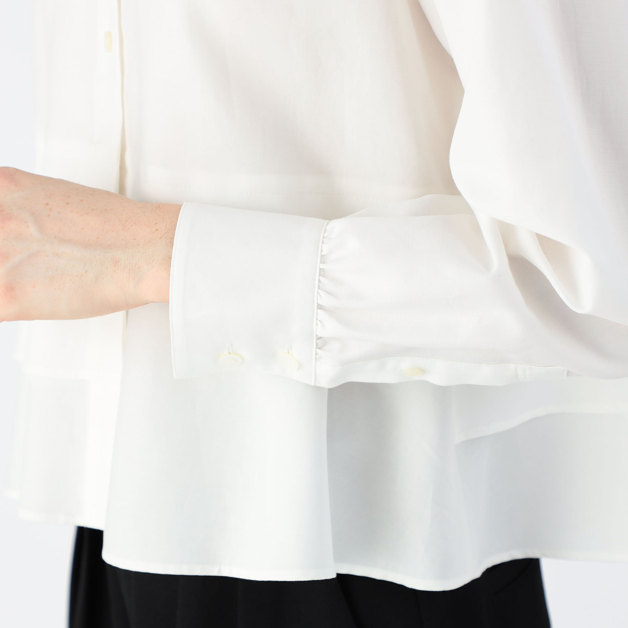 タイプライターダブルクロス アシンメトリックフリルロングスリーブ