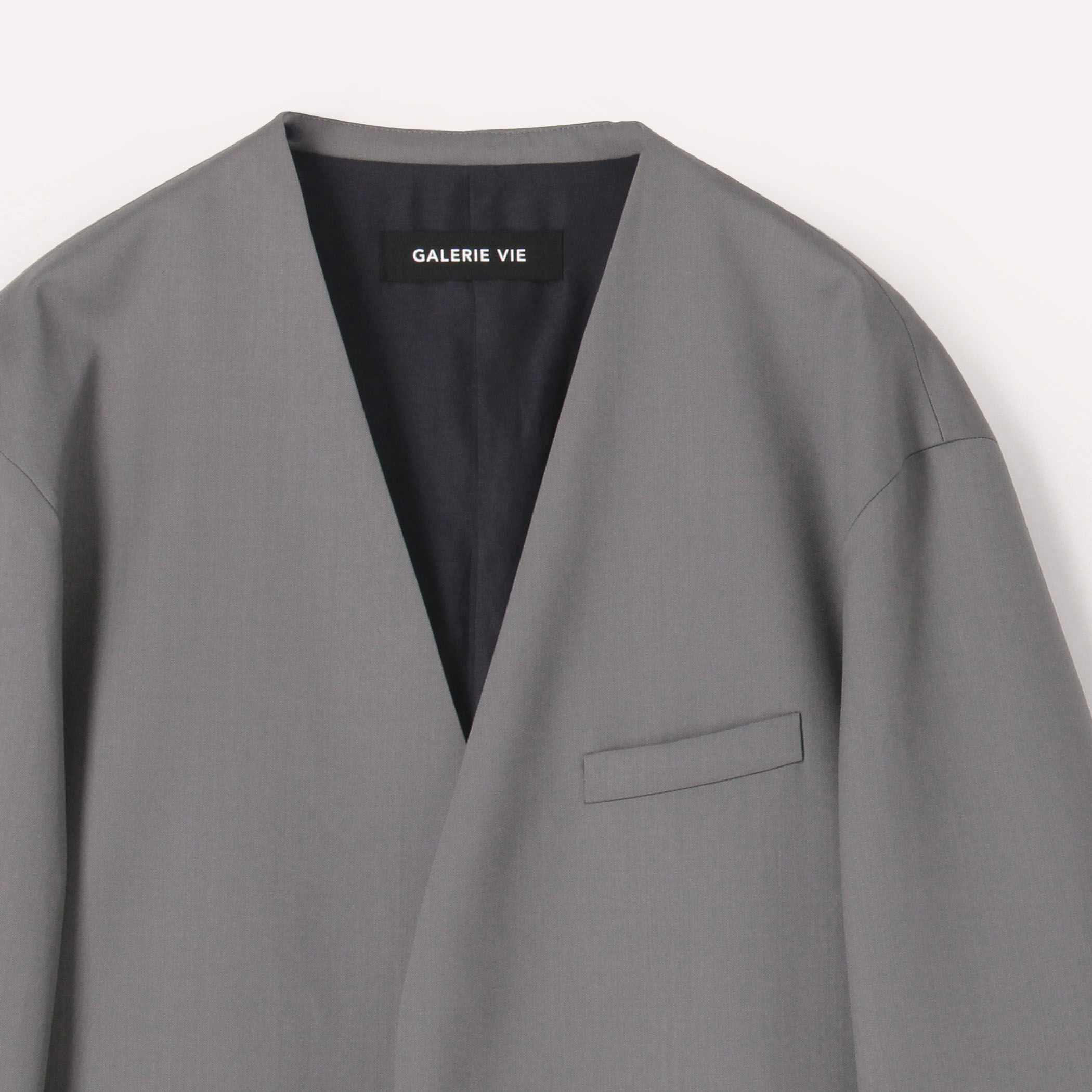 ウォッシャブルギャバジン カラーレスジャケット｜トゥモローランド