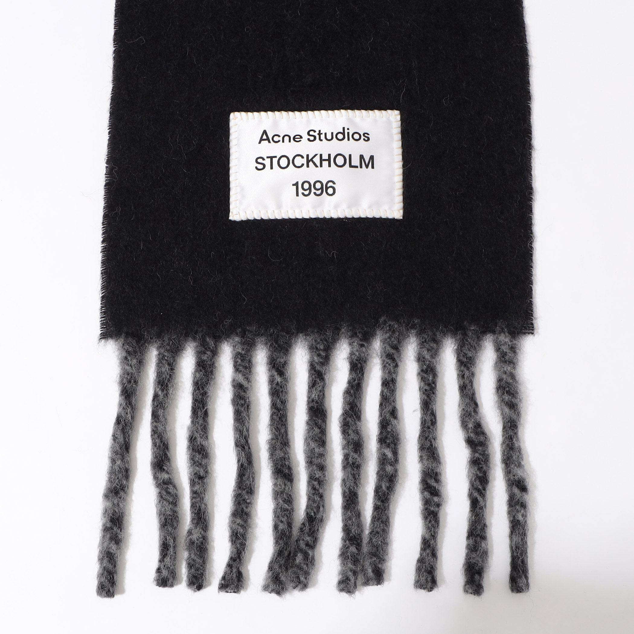 □Acne Studios ロゴフリンジスカーフ｜トゥモローランド 公式サイト