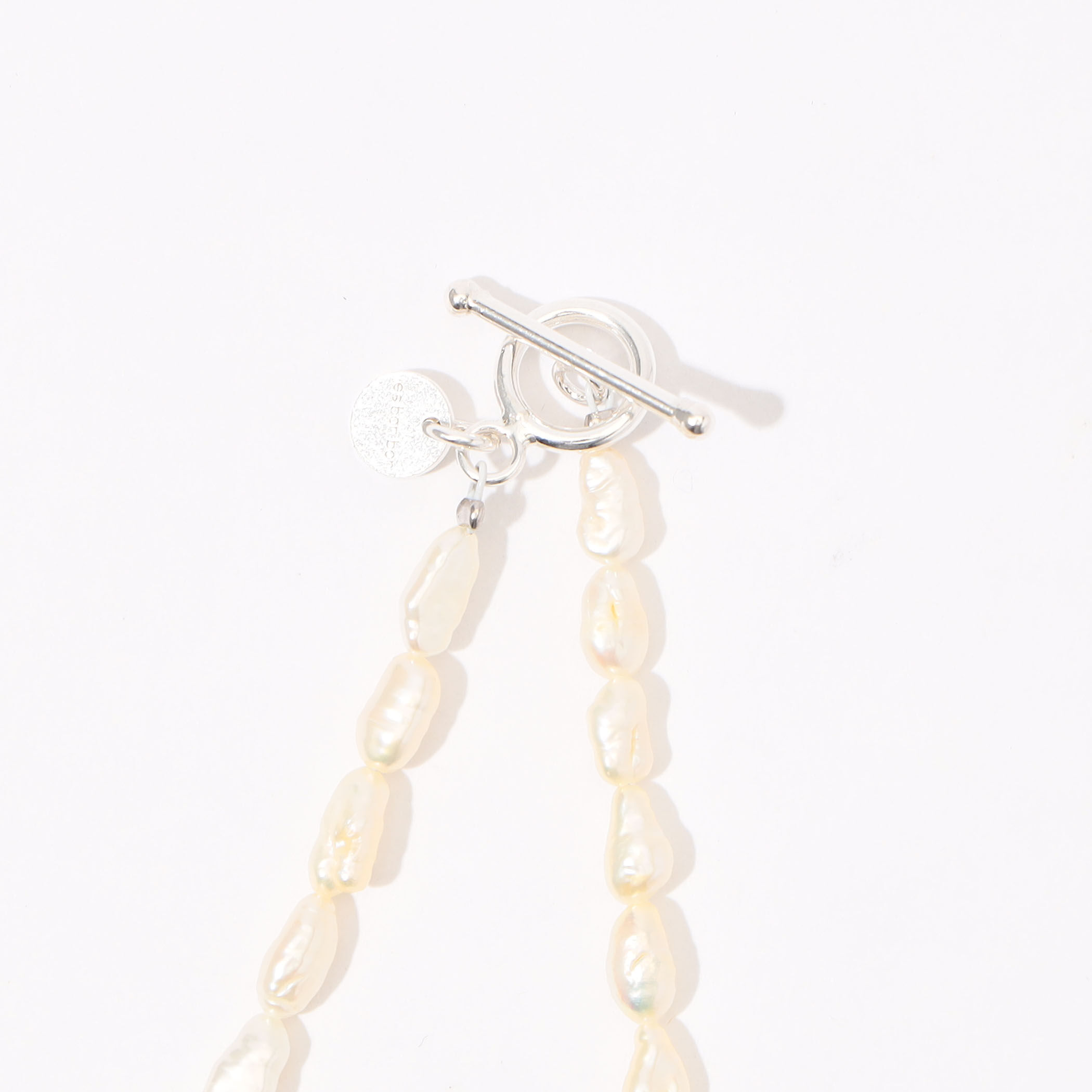les bonbon】bow pearl long necklace/ボウ パール ロング