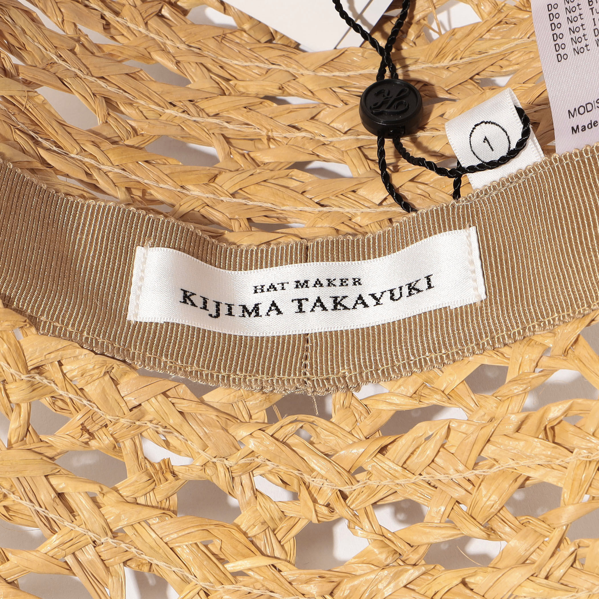KIJIMA TAKAYUKI RAFFIA HONEYCOMB BRAID BUCKET HAT