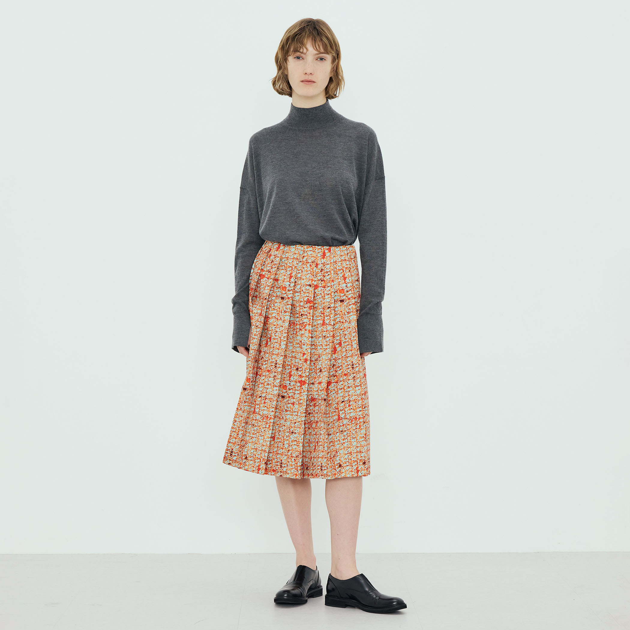 ポリエステル ツイードプリント プリーツスカート｜トゥモローランド