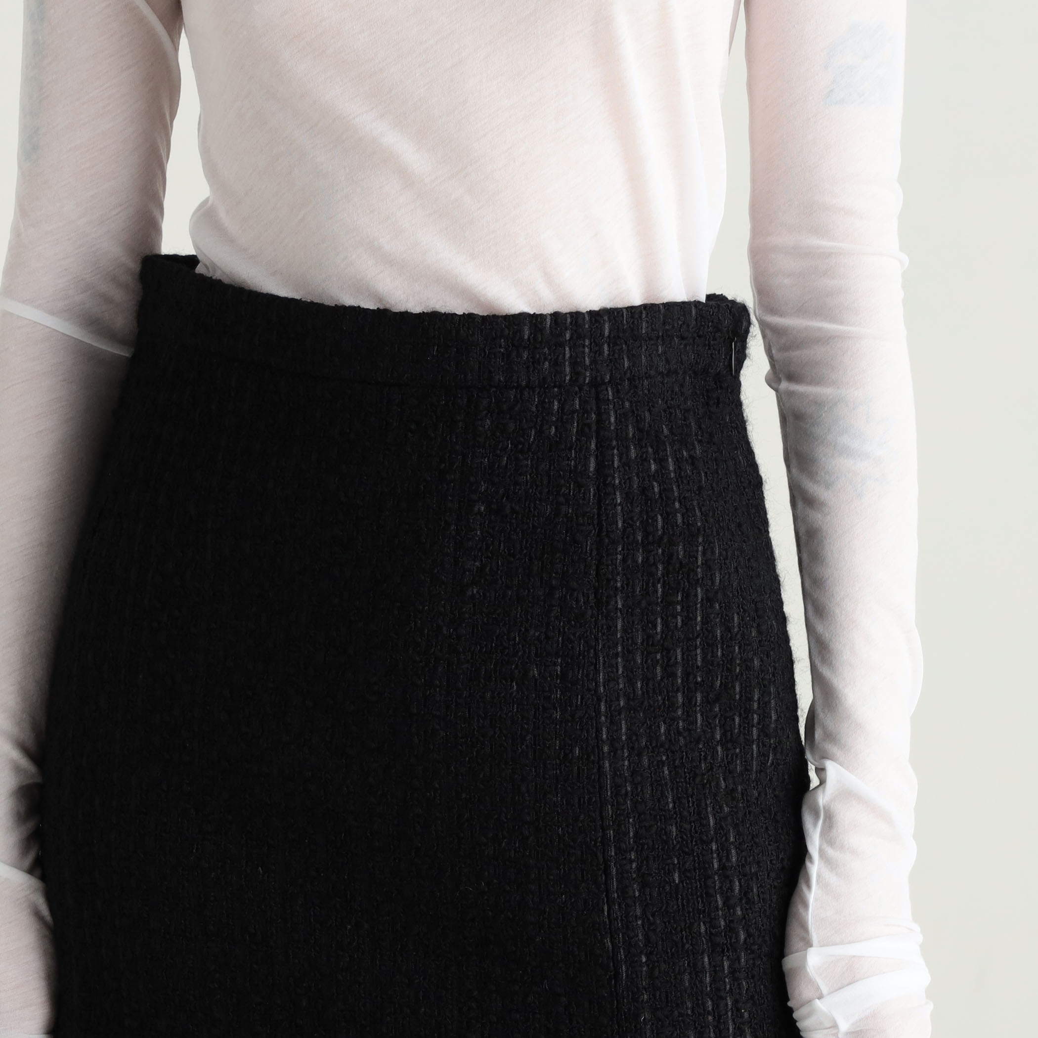 ○ブラックツイードヘムフレアスカート｜トゥモローランド 公式通販