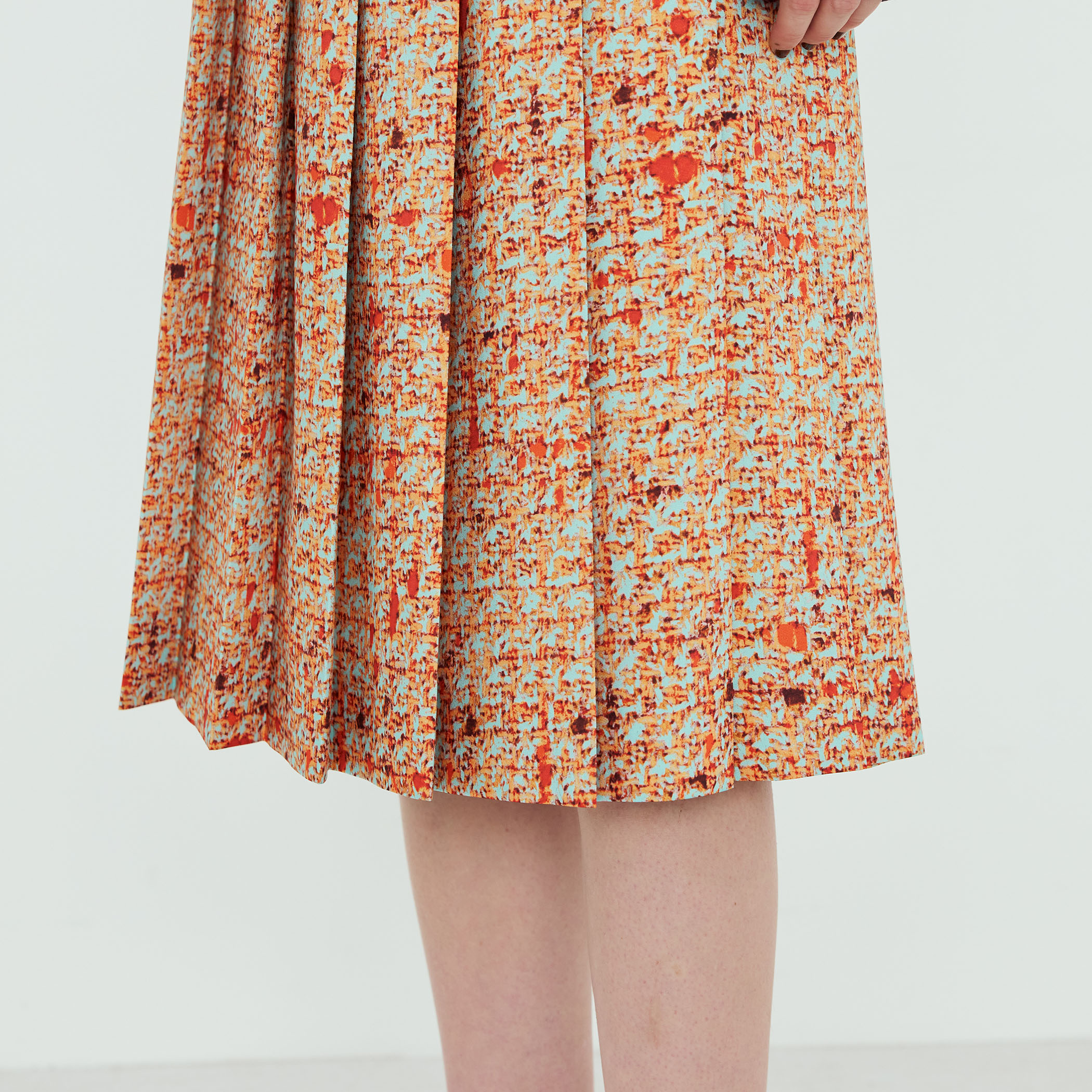 ポリエステル ツイードプリント プリーツスカート｜トゥモローランド