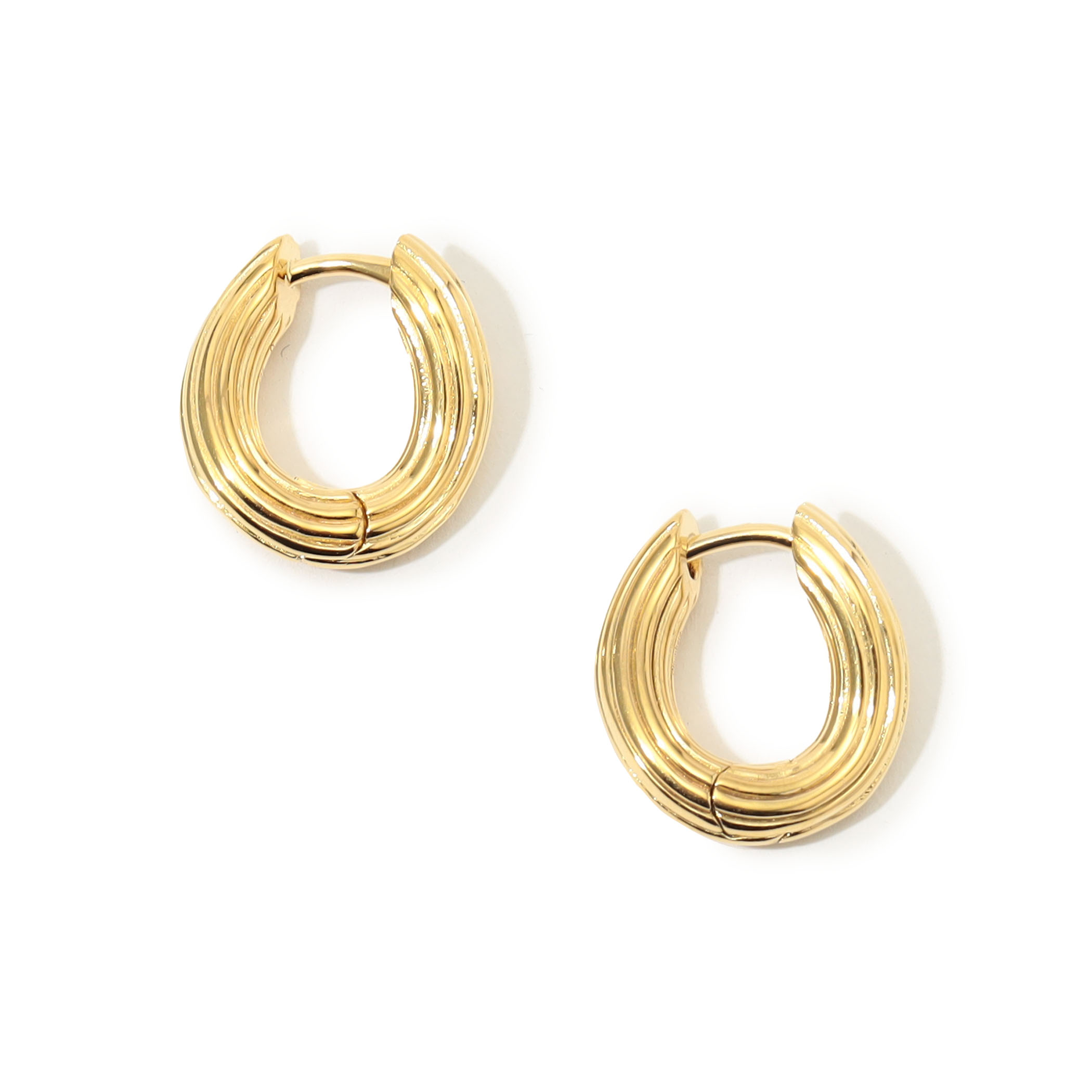 Otiumberg. Textured Carved Chunky ピアス