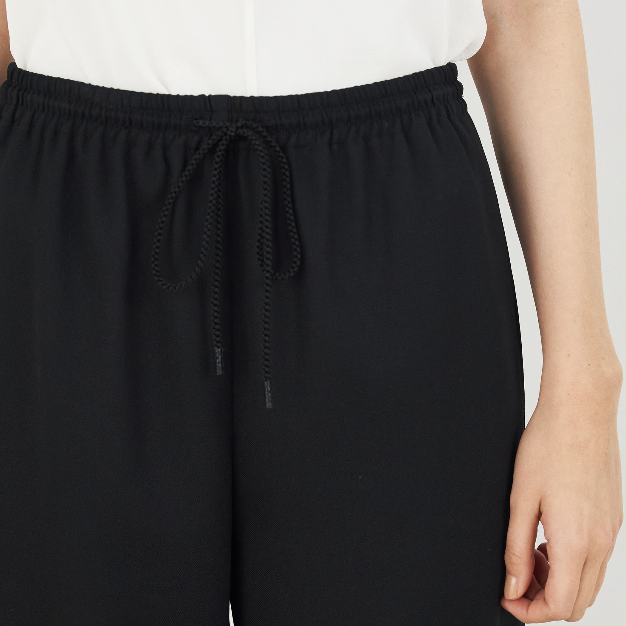 ポリエステルウールバラシャ テーパードパンツ｜トゥモローランド 公式通販