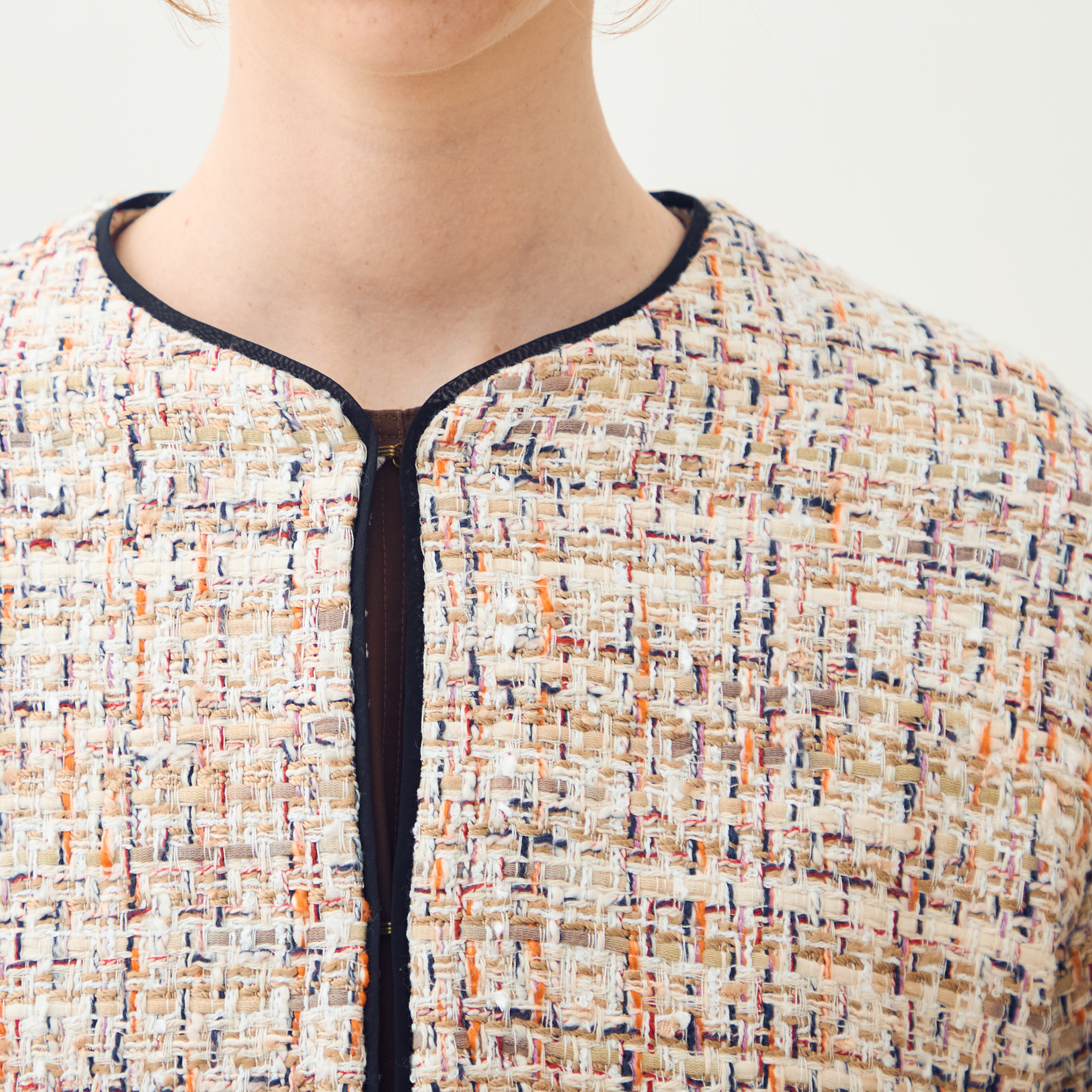 ホロウファンシーツイード ノーカラートリミングジャケット